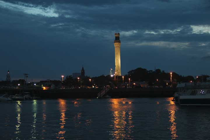 Provincetown Harbor, MacMillan PIer, sunset with view of Provincetown Monument
