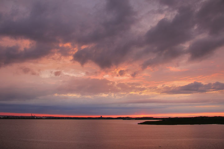 Ptown Sunset with Pilgrim Lake and Provincetown Monument on the horizon